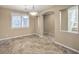 Open dining room area with tile floors and modern lighting at 7709 Tiny Tortoise St, Las Vegas, NV 89149