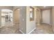 Inviting foyer with tile floors and arched doorways at 7709 Tiny Tortoise St, Las Vegas, NV 89149