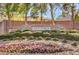 Landscaped entrance sign for Turtle Rock community featuring colorful flowers and greenery at 7709 Tiny Tortoise St, Las Vegas, NV 89149