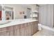 Bathroom vanity featuring modern fixtures, wood cabinets, and neutral color palette at 8255 S Las Vegas Blvd # 1907, Las Vegas, NV 89123
