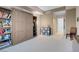 Bedroom featuring a murphy bed, closet shelving, and neutral color palette at 8255 S Las Vegas Blvd # 1907, Las Vegas, NV 89123