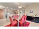 Open dining area with modern light fixture, stainless steel appliances, and seating for six at 8255 S Las Vegas Blvd # 1907, Las Vegas, NV 89123