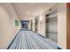 Modern condo hallway with elevators, bright lighting, and contemporary design at 8255 S Las Vegas Blvd # 1907, Las Vegas, NV 89123