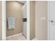 Hallway featuring modern finishes, neutral color palette, and a built-in cabinet at 8255 S Las Vegas Blvd # 1907, Las Vegas, NV 89123
