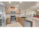 Modern kitchen features stainless steel appliances, granite countertops, and wood cabinetry at 8255 S Las Vegas Blvd # 1907, Las Vegas, NV 89123