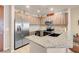 Modern kitchen features stainless steel appliances, granite countertops, and wood cabinetry at 8255 S Las Vegas Blvd # 1907, Las Vegas, NV 89123