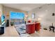Bright living room featuring hardwood floors, balcony access, and comfortable seating arrangement at 8255 S Las Vegas Blvd # 1907, Las Vegas, NV 89123