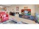Open living area featuring modern fireplace, media center, stylish furniture, and hardwood flooring at 8255 S Las Vegas Blvd # 1907, Las Vegas, NV 89123