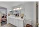 Bright bathroom featuring double vanity, neutral walls, and tile floors at 8657 Prairie Hill Dr, Las Vegas, NV 89134
