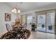 Bright dining area with a sliding glass door and views of the outdoor space at 8657 Prairie Hill Dr, Las Vegas, NV 89134
