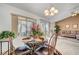 Bright dining area features large windows and modern decor at 8657 Prairie Hill Dr, Las Vegas, NV 89134