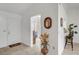 Bright entryway with white door and neutral decor at 8657 Prairie Hill Dr, Las Vegas, NV 89134