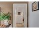 Hallway with neutral colors leading to the bathroom at 8657 Prairie Hill Dr, Las Vegas, NV 89134