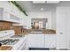 Updated kitchen showcasing granite counters and modern appliances at 8657 Prairie Hill Dr, Las Vegas, NV 89134