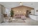 This bright living room boasts large windows and neutral decor, perfect for relaxation at 8657 Prairie Hill Dr, Las Vegas, NV 89134