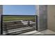 View from the balcony showing landscaping, sidewalks, and open space beyond at 883 Apatite Pl # Lot 57, Henderson, NV 89011
