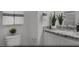 Primary bathroom featuring granite countertop vanity, modern fixtures, and decorative towels at 883 Apatite Pl # Lot 57, Henderson, NV 89011
