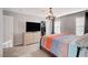 This bedroom features soft carpet, a decorative chandelier, and light neutral walls at 1045 Spotted Saddle St, Henderson, NV 89015