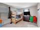 Cozy bedroom with bunk beds, soft carpeting, and colorful accents for a playful atmosphere at 1045 Spotted Saddle St, Henderson, NV 89015