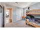 A bunk bed occupies a carpeted room with a closet, two windows, and view to the doorway at 1045 Spotted Saddle St, Henderson, NV 89015
