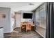 Bonus room with piano, natural light and view of the window and doorway at 1045 Spotted Saddle St, Henderson, NV 89015
