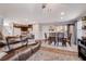 Open-concept living and dining area with natural light, creating a welcoming and spacious atmosphere at 1045 Spotted Saddle St, Henderson, NV 89015