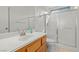 Well-lit bathroom featuring modern fixtures, vanity, and a glass-enclosed shower at 1077 Las Palmas Entrada Ave, Henderson, NV 89012