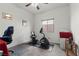 Bedroom featuring exercise equipment, neutral walls, and carpeted floors at 1077 Las Palmas Entrada Ave, Henderson, NV 89012