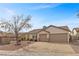 Charming single-story home with low maintenance landscaping and a spacious two-car garage at 1077 Las Palmas Entrada Ave, Henderson, NV 89012