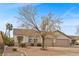 Charming single-story home featuring desert landscaping and a spacious two-car garage at 1077 Las Palmas Entrada Ave, Henderson, NV 89012