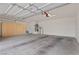 Spacious garage with storage cabinets and epoxy flooring at 1077 Las Palmas Entrada Ave, Henderson, NV 89012