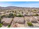 A neighborhood featuring houses with desert landscaping and mountain views in the background at 1077 Las Palmas Entrada Ave, Henderson, NV 89012