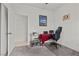 Home office with desk, workspace, neutral walls, and wood-look floors at 1077 Las Palmas Entrada Ave, Henderson, NV 89012