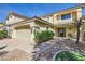 Charming two-story home with a well-maintained yard and a two-car garage at 10900 Calcedonian St, Las Vegas, NV 89141