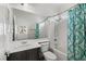 Well-lit bathroom with combined shower and tub at 11484 Roncat Ct, Las Vegas, NV 89141