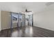 Spacious bedroom with wood-like flooring, ample natural light and modern ceiling fan at 11484 Roncat Ct, Las Vegas, NV 89141