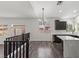 Kitchen with marble countertops, hardwood floors, and stainless steel appliances at 11484 Roncat Ct, Las Vegas, NV 89141