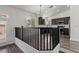 Modern kitchen featuring dark wood cabinets, stainless steel appliances, and marble countertops at 11484 Roncat Ct, Las Vegas, NV 89141