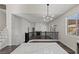 Open concept living room featuring hardwood floors and fireplace at 11484 Roncat Ct, Las Vegas, NV 89141
