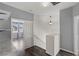 Upstairs hallway with built-in shelves, and a window at 11484 Roncat Ct, Las Vegas, NV 89141