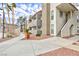 Attractive building exterior showcasing stucco, balconies, stairs and desert-friendly landscaping at 1212 Bass Dr # C, Henderson, NV 89014