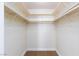 Walk-in closet with rod and shelf storage space, carpet, and neutral walls at 1212 Bass Dr # C, Henderson, NV 89014