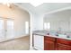 Efficient kitchen with white appliances and granite countertops at 1212 Bass Dr # C, Henderson, NV 89014