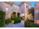 Stunning home exterior with manicured landscaping and inviting entryway exudes curb appeal at 1212 Muscato Ct, Las Vegas, NV 89144