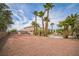 Expansive backyard with ample space for outdoor activities, landscaping and mature trees at 1304 Husson Ct, Las Vegas, NV 89142