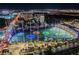 Stunning aerial view of Topgolf Las Vegas with colorful lights and the cityscape in the background at night at 135 Harmon Ave # 3220, Las Vegas, NV 89109
