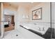 Bathroom showcasing the jetted tub in the bathroom and glass enclosed walk-in shower at 135 Harmon Ave # 3220, Las Vegas, NV 89109