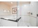 Bathroom featuring the jetted tub and the glass enclosed walk-in shower at 135 Harmon Ave # 3220, Las Vegas, NV 89109