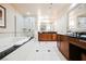 Bright bathroom with double vanity, soaking tub, and glass enclosed walk-in shower at 135 Harmon Ave # 3220, Las Vegas, NV 89109