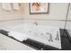 Bathroom highlighting the luxurious jetted tub with upscale finishes and fixtures at 135 Harmon Ave # 3220, Las Vegas, NV 89109